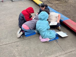 2.5 small group using outdoor classroom materials